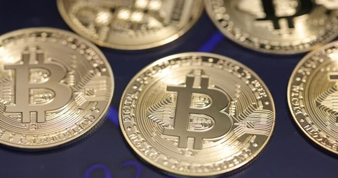 Golden bitcoin on trading chart background. Success and bullish price concept on cryptocurrency and stock market value. Bitcoin crypto currency. BTC coins. Blockchain technology, Bitcoin concept.