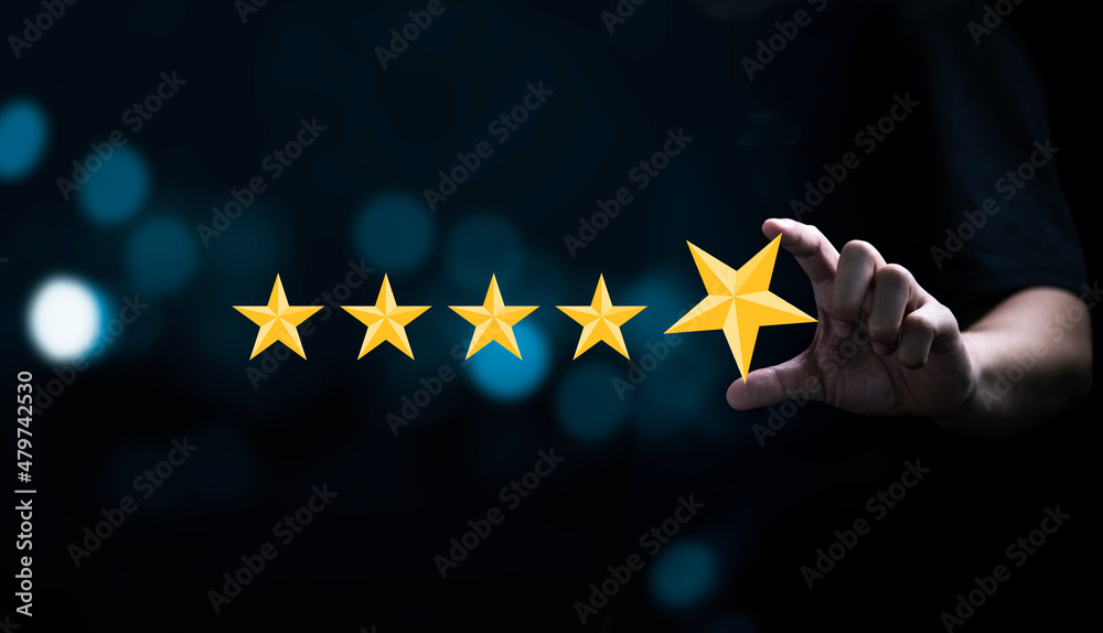 Poster businessman holding and input yellow star to five stars for customer satisfaction after use product 