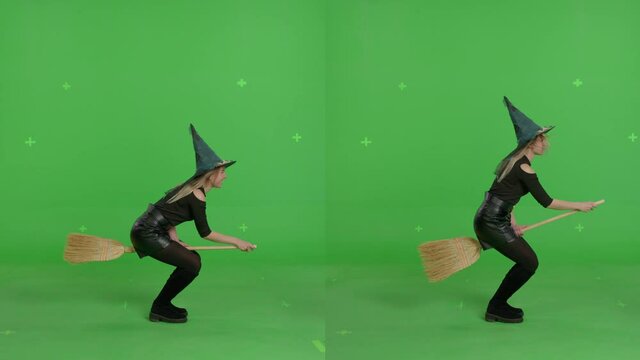Young woman in a witch hat and black clothes flying on broomstick over green screen background. Halloween concepte. Chroma key. Side view 4k uhd video