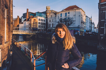 Fototapeta na wymiar Young Woman Tourist in Old Town of Ghent