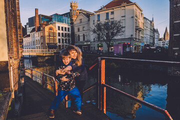 Mother and Son Having Fun at Canal in Ghent