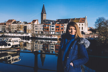 Fototapeta na wymiar Young Woman Tourist in Marina of Ghent