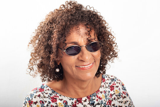 Happy mature woman wearing sunglass