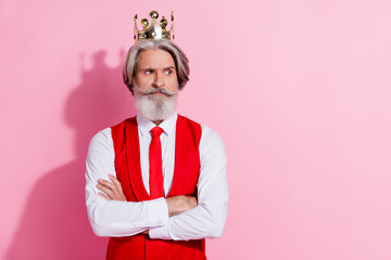 Portrait of attractive serious minded grey-haired man wearing crown folded arms think copy space...