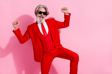 Photo of excited crazy handsome man rejoice dancing nightclub feel young isolated on pink color background