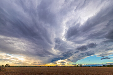 Amazing clouds over the fields. Scenic view. Natural background