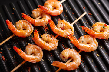 Freshly cooked shrimps on a grill