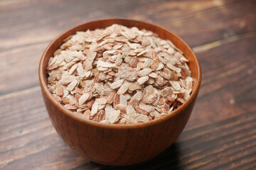 red Flattened rice in a bowl on gray background 