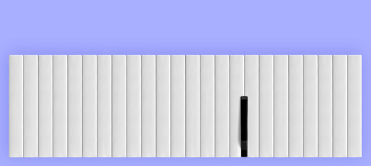 Abstract layout with black piano key among white piano keys isolated on purple-blue background. Creative wallpaper. Note card idea. The concept of music festival or concert. Minimal flat lay.