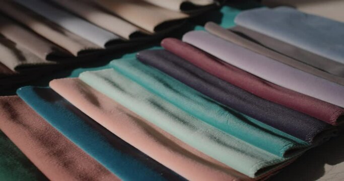 Dolly shot: Set of fabric samples - a palette for choosing a material for furniture, sewing clothes and other