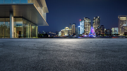 Obraz premium Panoramic skyline and modern commercial office buildings with empty road in Shanghai, China. Asphalt road and cityscape.