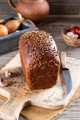 Traditional Russian rye Borodino bread on a table.