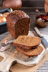 Borodino bread sliced on a table.