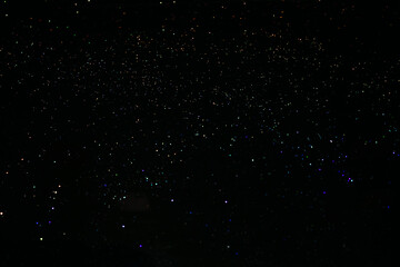 abstraction of a star on a small black background