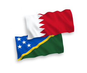 Flags of Solomon Islands and Bahrain on a white background