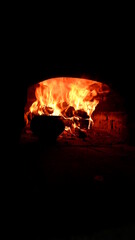 kindle the oven for cooking in the morning