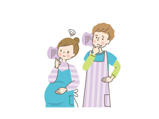 お腹の中の赤ちゃんを心配する妊婦と寄り添う夫