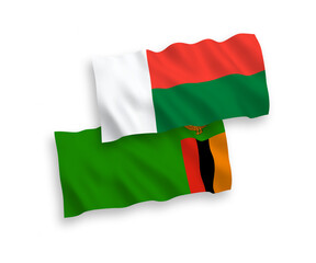 Flags of Republic of Zambia and Madagascar on a white background