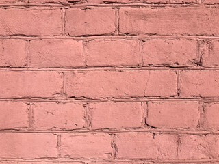 Brick texture in industrial area, light red coloured creative background.