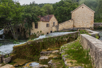 Fototapeta na wymiar Water mill in Krka national park, Croatia