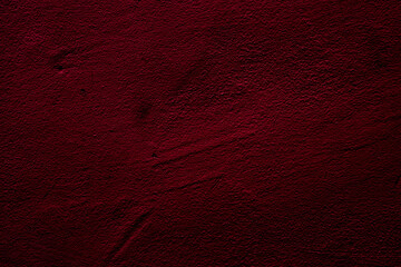 Crimson colored wall background with textures of different shades of crimson red