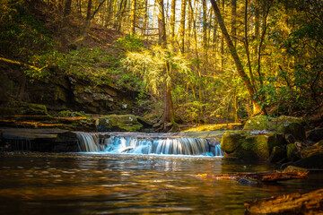 A small quaint waterall on the creek gurgles along the Fiery Gizzard Trail on the South Cumberland Plateau in Tennessee.