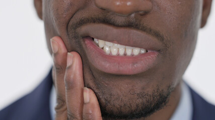 Close up of African Face With Toothache on White Background