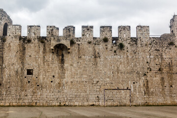 Fototapeta na wymiar Walls of Kamerlengo castle in Trogir, Croatia