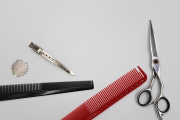 set of professional stylist tools on a light background