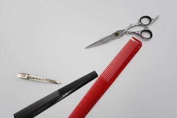 set of professional stylist tools on a light background