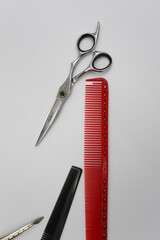 set of professional stylist tools on a light background