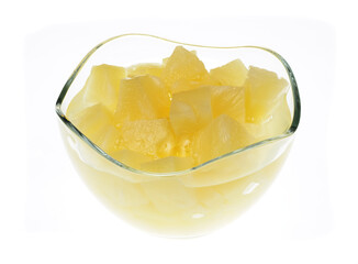 A bowl of pineapple in syrup, on a white background