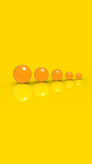 Five glass balls of different sizes of yellow color on yellow background. Growth of something. Progress. Vertical image. 3D image. 3D rendering.