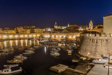 Fototapeta na wymiar Evening view of boats in the old town of Dubrovnik, Croatia