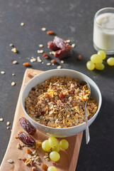 Fresh granola, muesli with yogurt and berries on marble background. Healthy breakfast. Copy space. Top view.