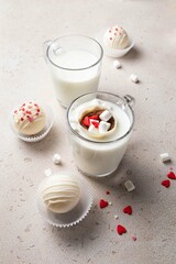 Hot cocoa chocolate ball bomb with marshmallow. Holiday winter drink. Handmade Valentines day present. Selective focus.