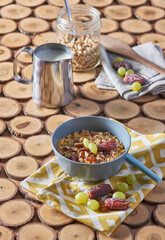 Fresh granola, muesli with yogurt and berries on marble background. Healthy breakfast. Copy space. Top view.