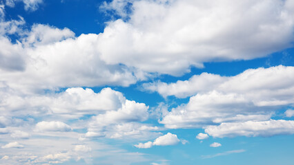 Blue sky with soft white clouds in sunny day