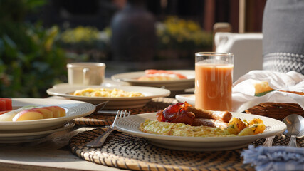 Breakfast with tea and food on a sunny morning in a hotel in Kathmandu, Nepal.