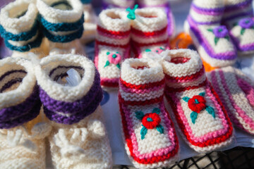 Fototapeta na wymiar Handmade wool winter retro knitted colorful socks .