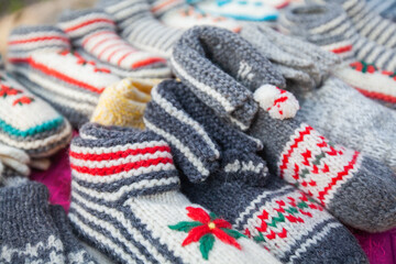Fototapeta na wymiar Handmade wool winter retro knitted colorful socks .