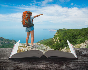Girl hiker with backpack on the book