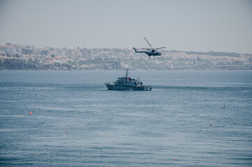 Portuguese Marine Corps at Praia De Carcavelos Beach Lisbon: Helicopter above Marine military navy ship