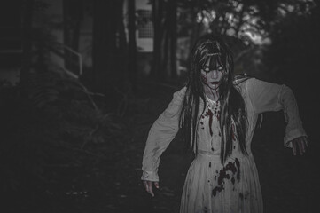 Portrait of asian woman make up ghost,Scary horror scene for background,Halloween festival...