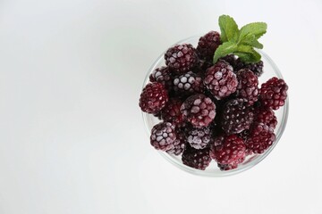 blackberry with green in the glass