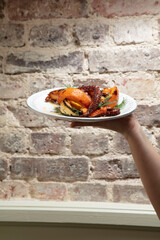 Poulpe moelleux et braisé, petit légumes 