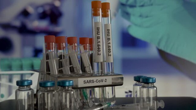 IHU B.1.640.2 Variant Samples In Laboratory Test Tubes Being Placed Into Rack. Locked Off
