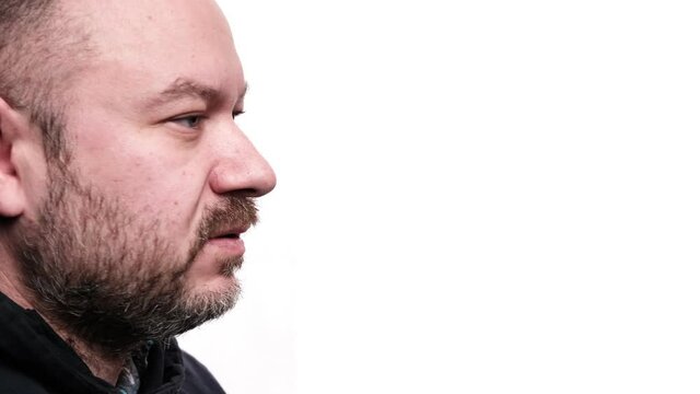 The man says no. White background. A middle-aged man, forty years old. Side view.