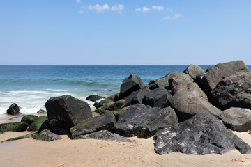 Rocks along the Shore of the Atlantic Ocean on Long Branch Beach in Long Branch New Jersey