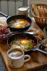 Homemade village lunch with fried eggs and coffee